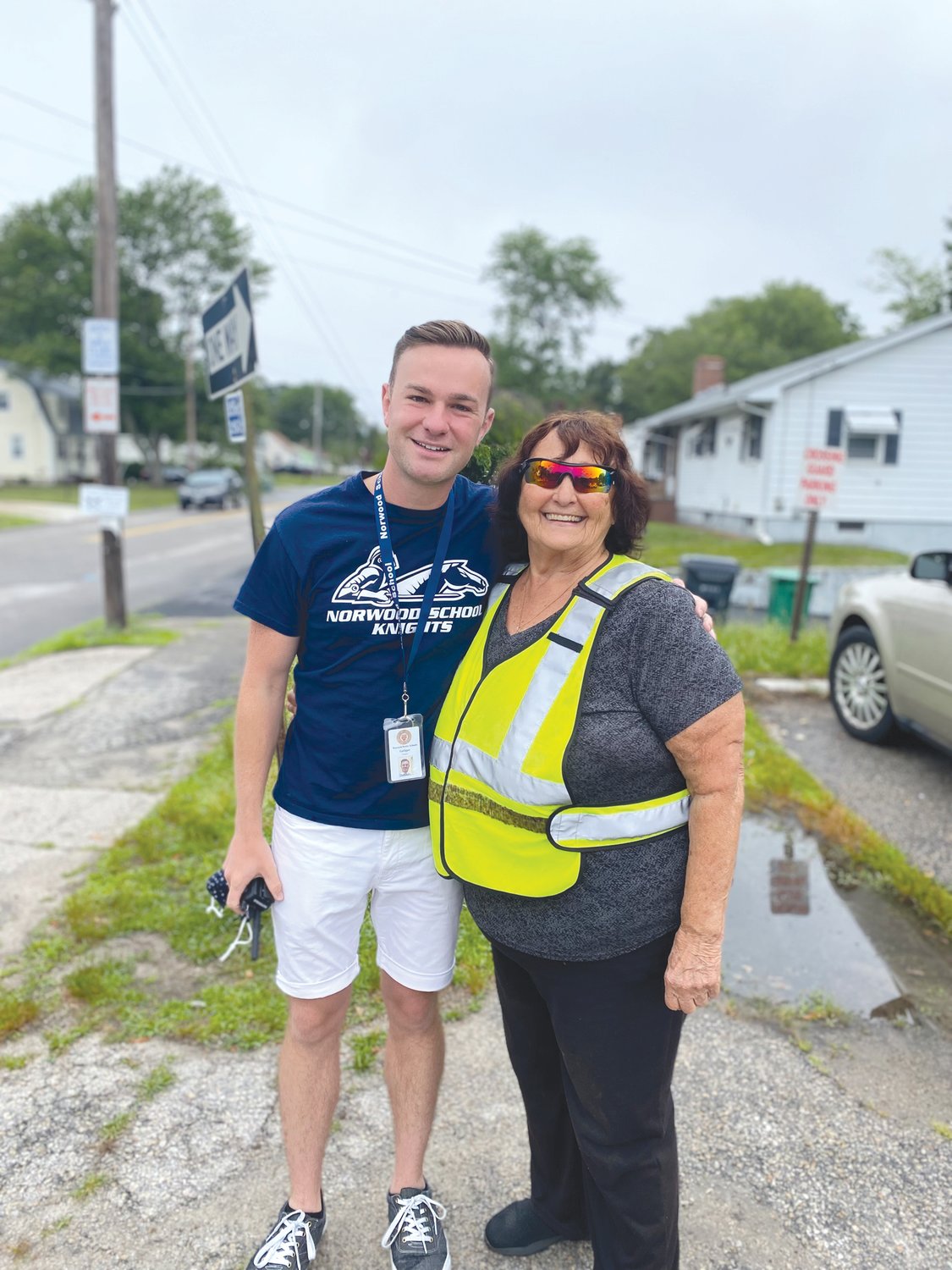 NOMINEE:
Warwick Elementary
School Principal
Frank
Galligan is a
nominee for
the Rhode
Island Outstanding
Beginning
Principal
of the
Year award.
He is pictured
here
with crossing
guard
Gerry Davis
while serving
as interim
principal at
Norwood
School.
(Submitted
photo)